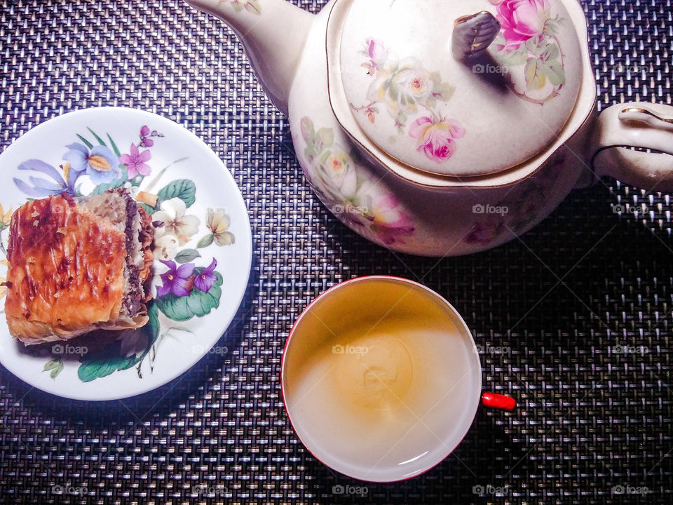 a piece of chocolate pie and tea