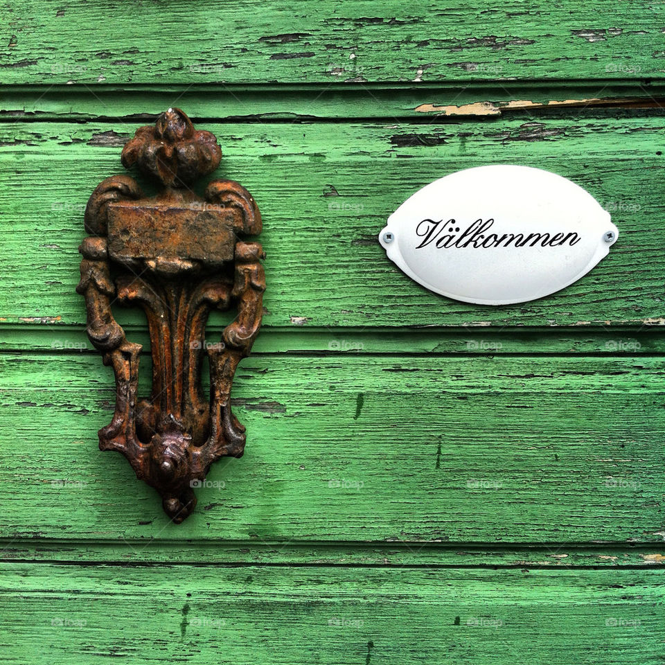 green sweden sign door by dandelion