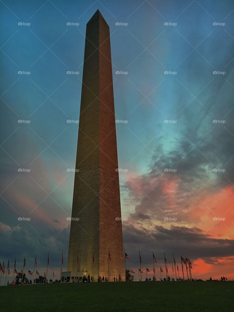 Washington Monument at sunset with storm clouds 
