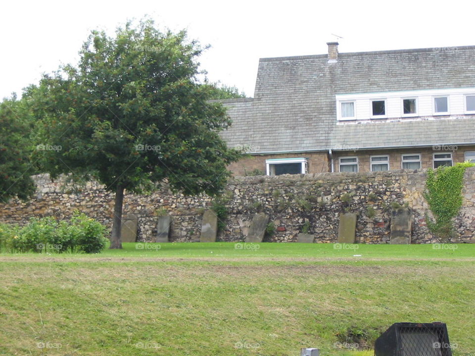 Headstones on the wall.