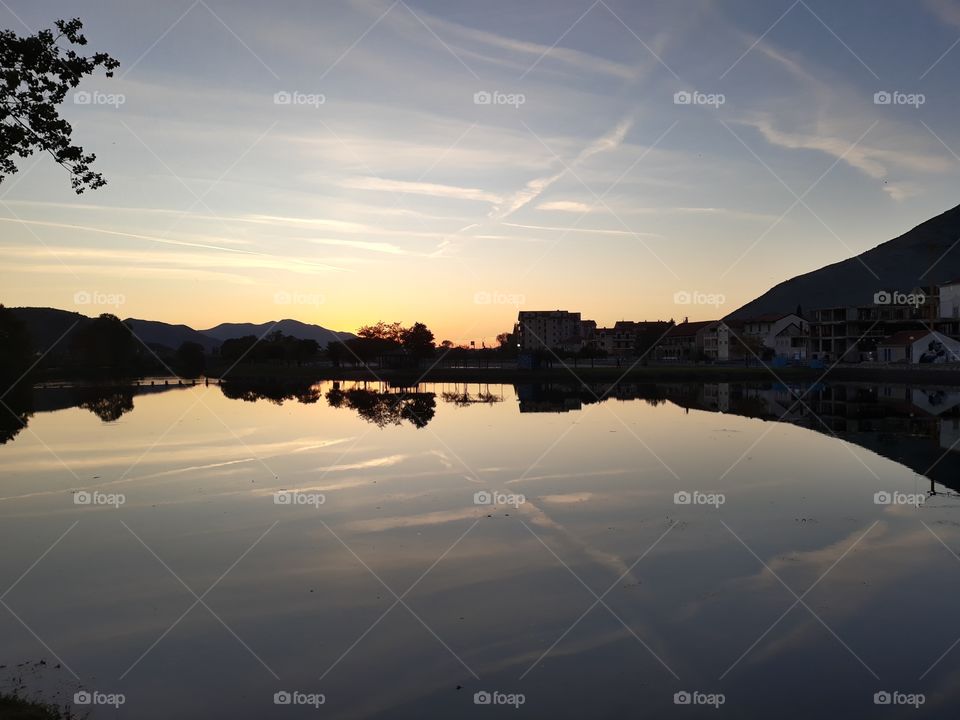 A reflection of the sky in the water
