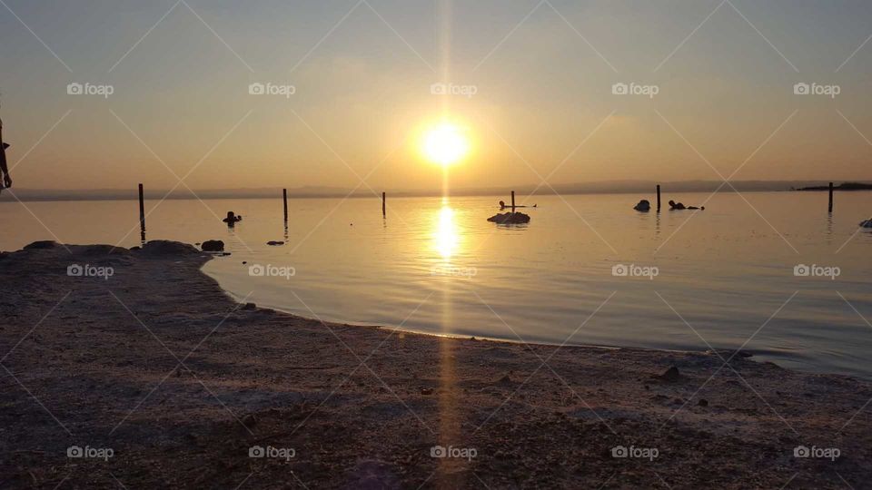 Sunset#beach#lake#sky#rocks#reflection