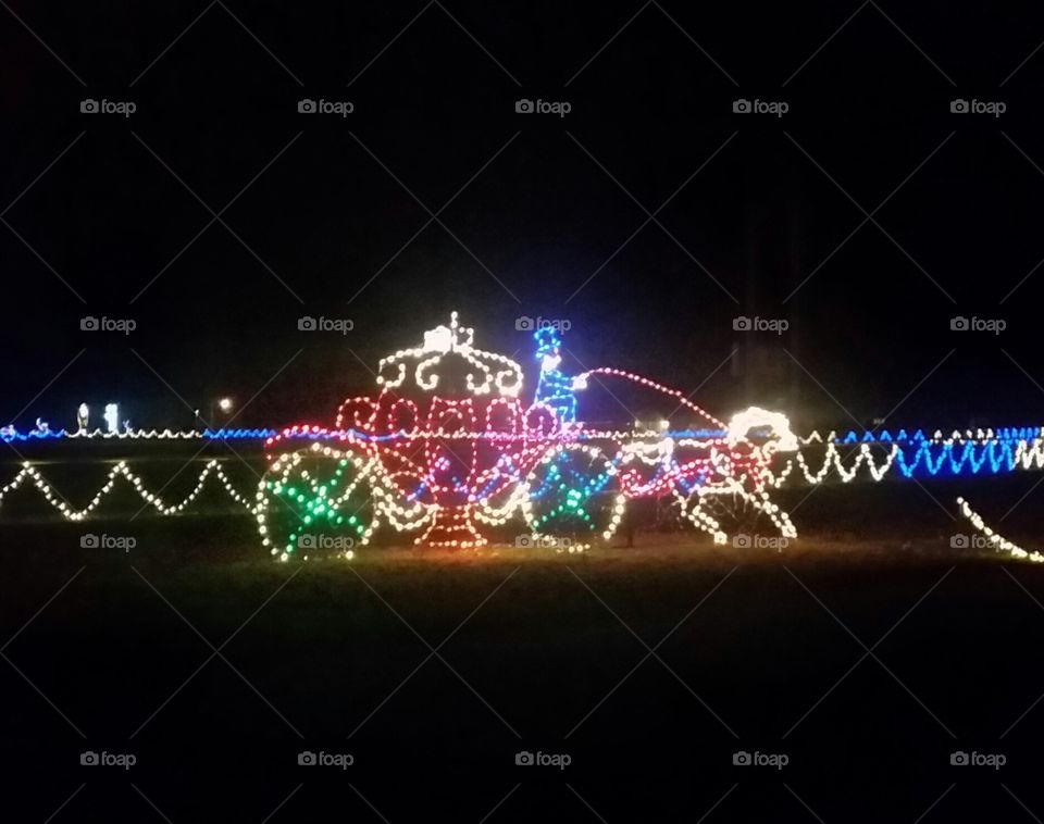 Carriage. Christmas lights.