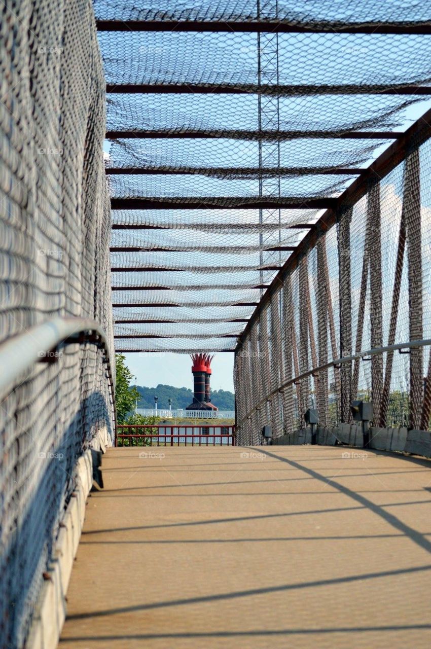 Fenced in over head bridge