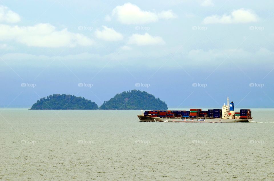 Ship passing through Malacca Straits