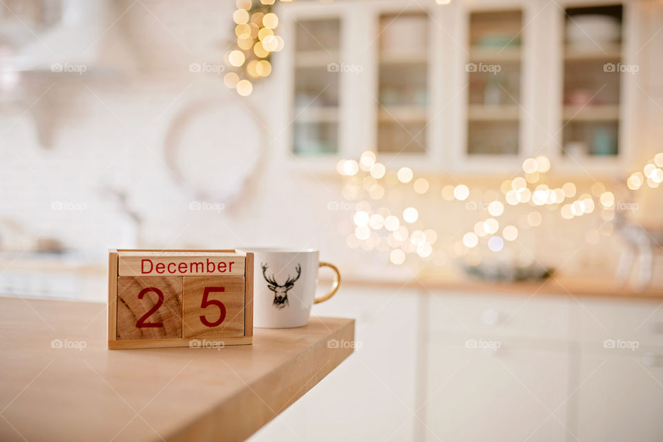 Christmas background with wooden block calendar with the date of December 25