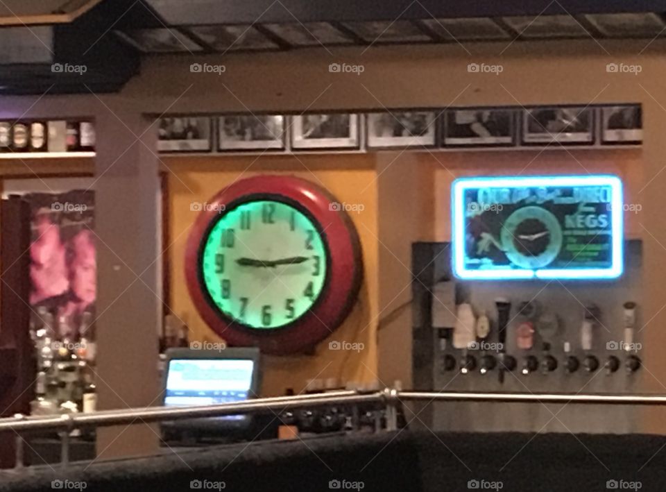 Clock at a bar
