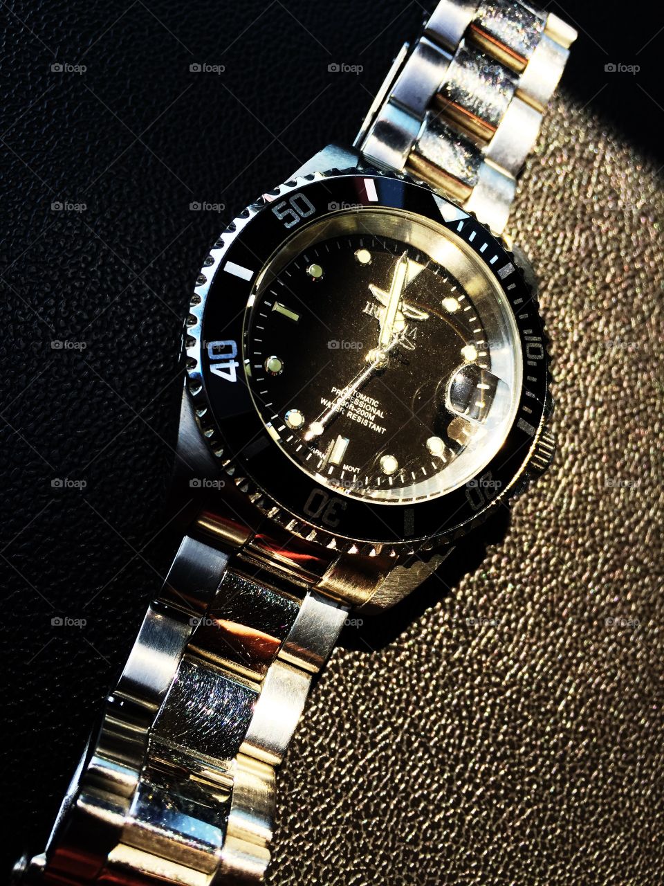 Watch. Invicta wristwatch in sunlight.