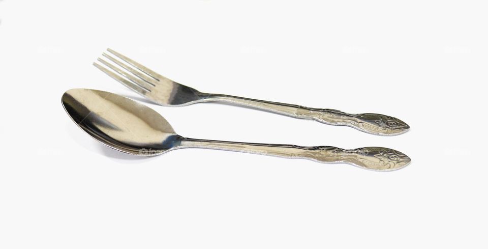 Spoon and fork photo on a white background