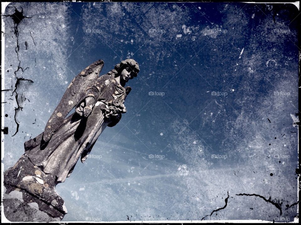Angel statue grunge background 