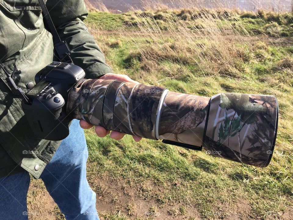 Not my camera but spotted a guy along my local riverbank and asked to take a snap .. he agreed … many lenses and a camouflage cover to protect it … hope he manages to get a great shot of the heron !