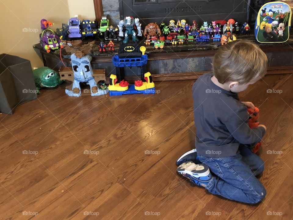 Toys and a little boy