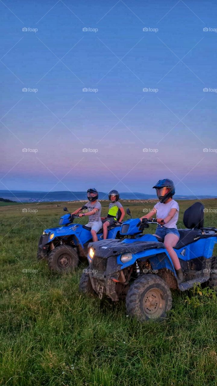 A ride on ATV during sunset