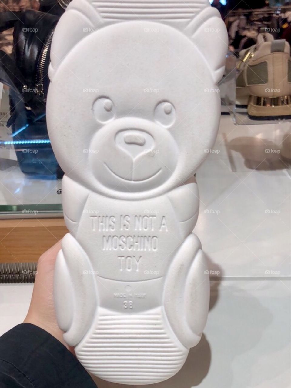 Selfie in a shoe store - sole with the form of a bear of a famous brand
