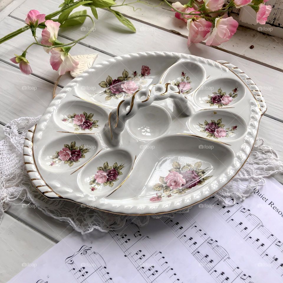 Easter porcelain egg basket with flower ornament