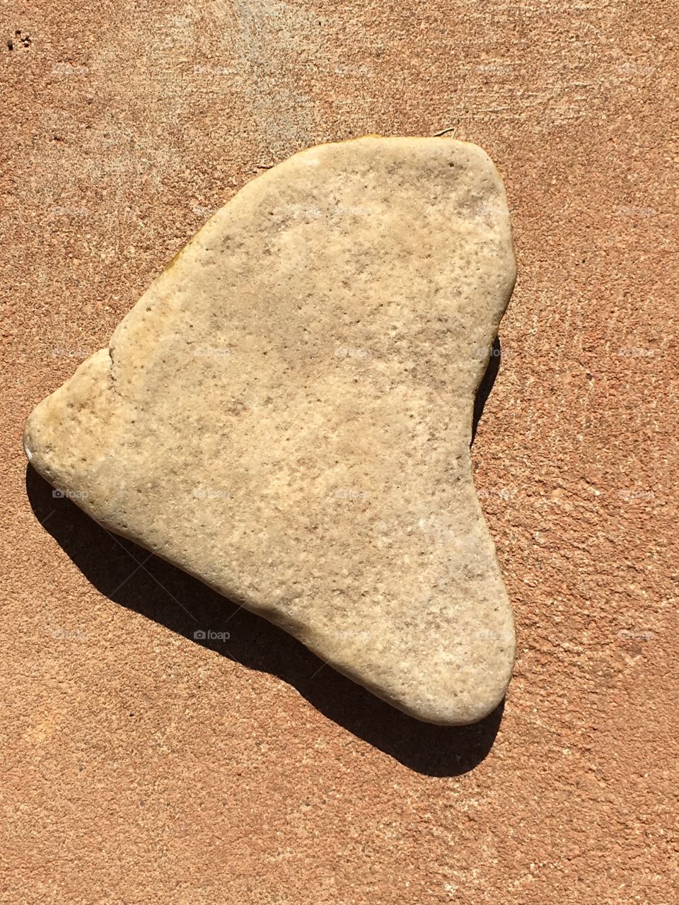 Heart shaped stone natural background 