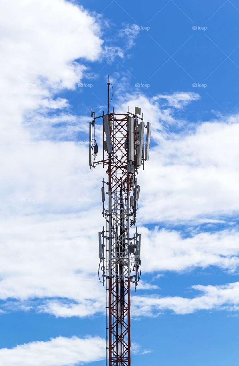 Telecommunication tower with blue sky