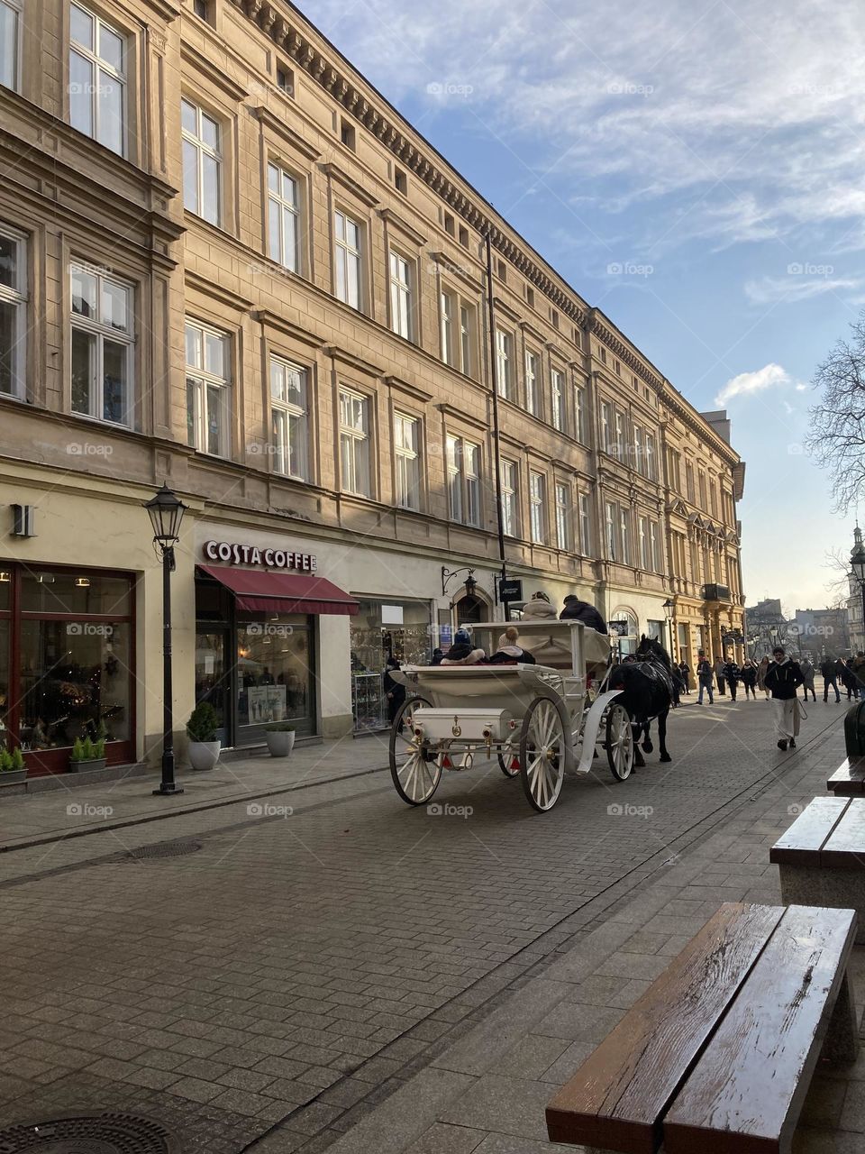 Charming streets of Kraków. Sunny day in Kraków Poland. Lovely walk in the city. Day trip. Discover new places. Time for adventure. Cold day in the winter. Sightseeing the city by walk. 
