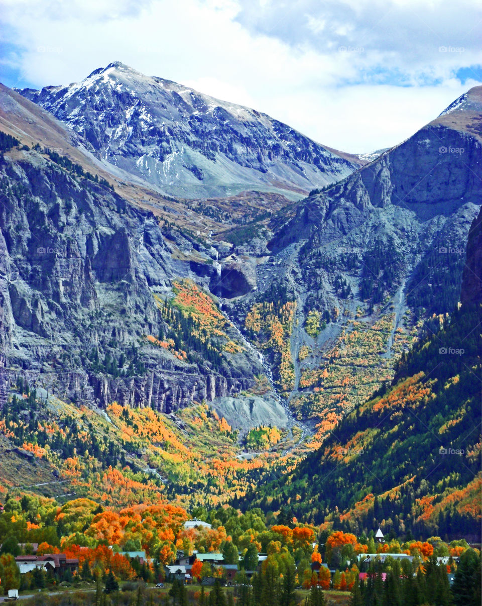 Colorful  Telluride mountainside in the fall with waterfall.