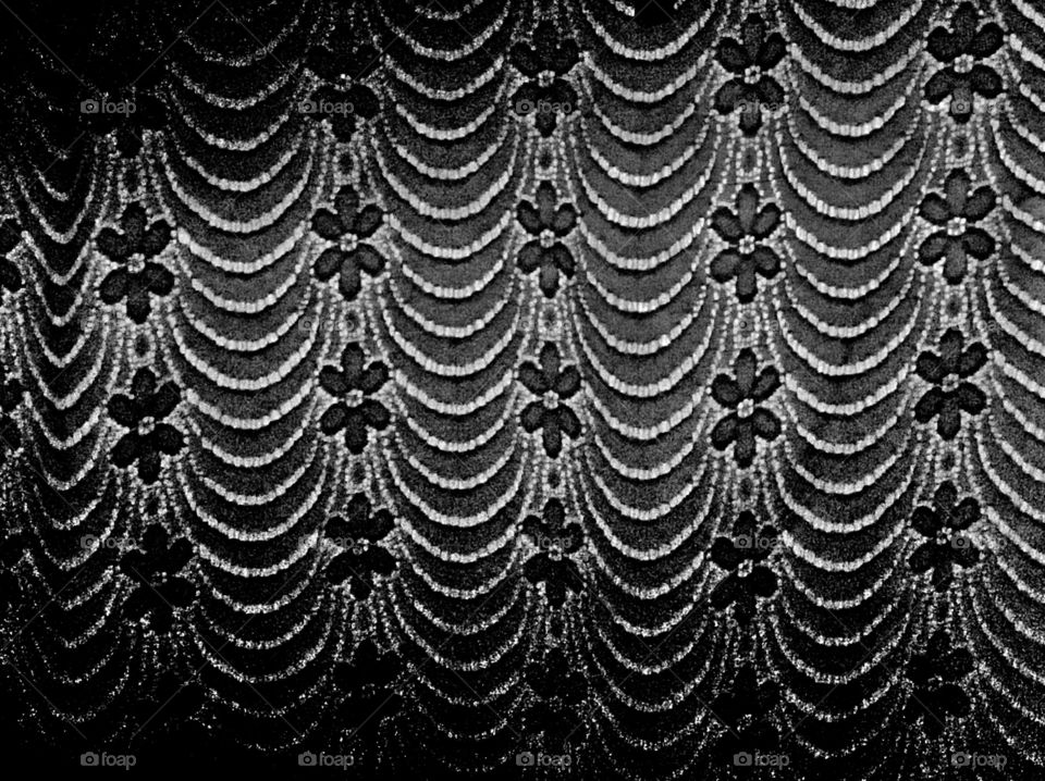 Lace curtain at night
