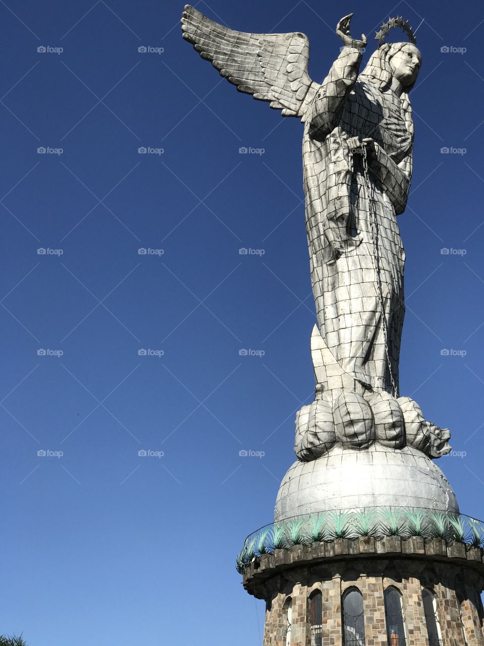 Monument Panecillo in Quito Ecuador on a beautiful clear blue sky day in the early spring.