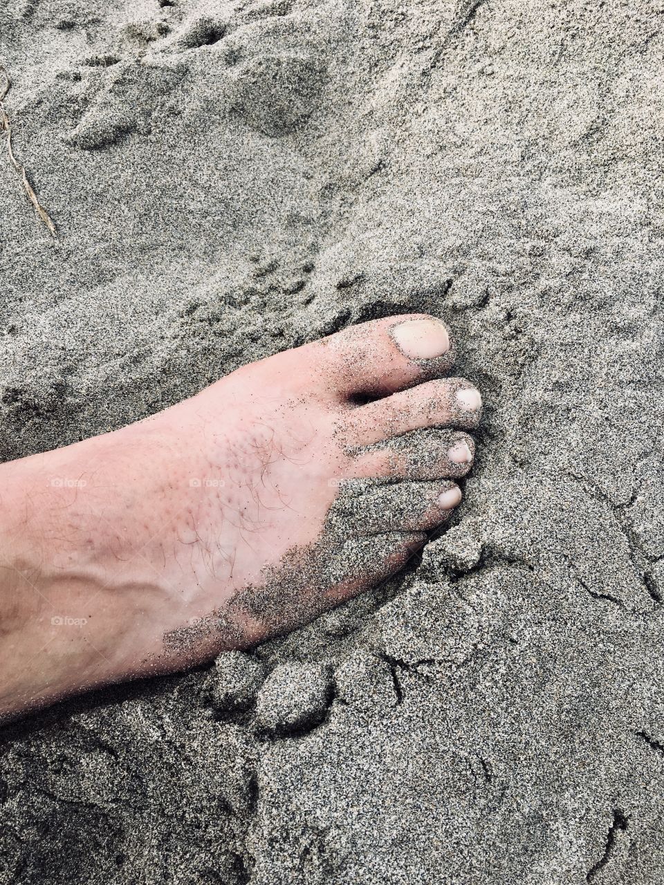 Feet in sand