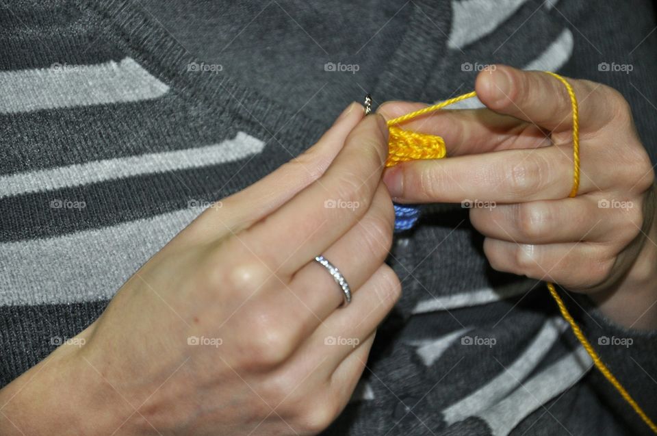 Close-up of a person knitting