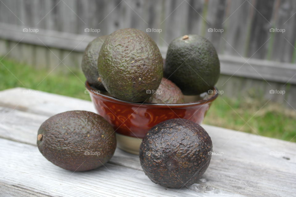 Avocado on a wooden table 