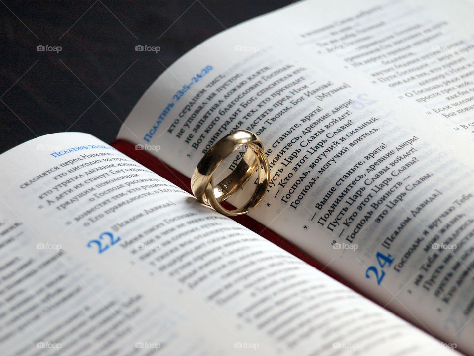 Wedding rings and book