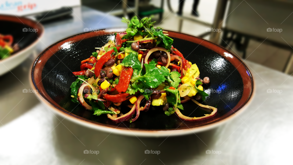 Avocado and roast peppers with red onion sweet corn coriander and chilli mint dressing