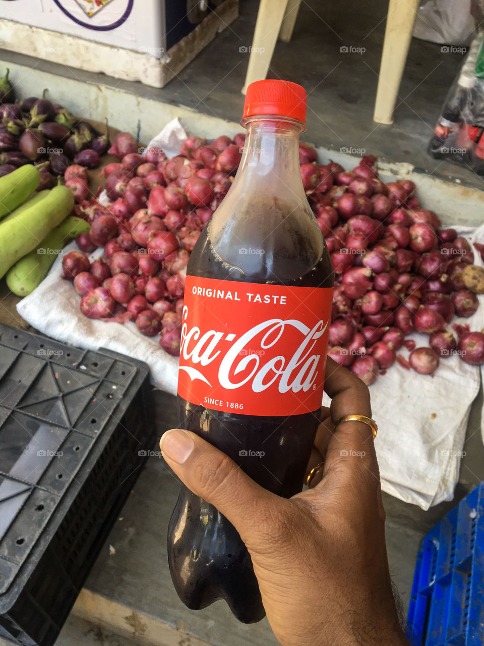 A jar of brand new and Fresh Coca-Cola from the market