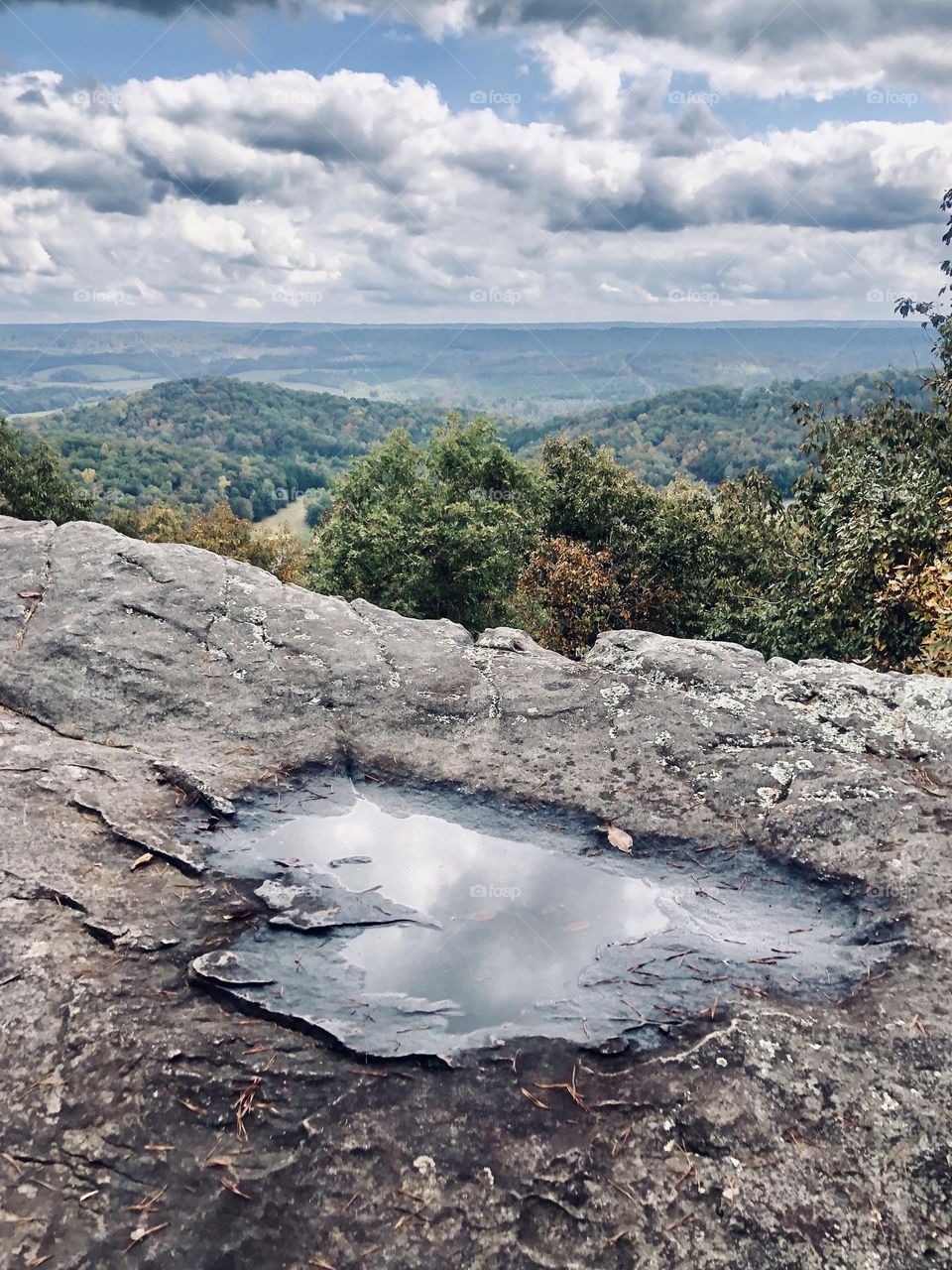View from a rain soaked rocky crag in the foothills of the Appalachian mountains of the United States.