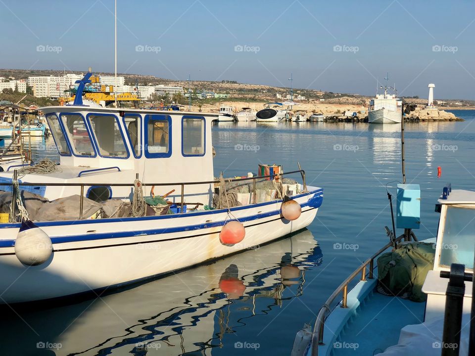 Fishing boats in the calm harbour 