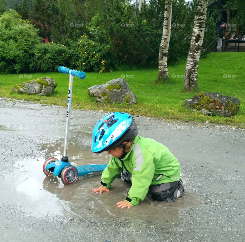 Playing on the puddle