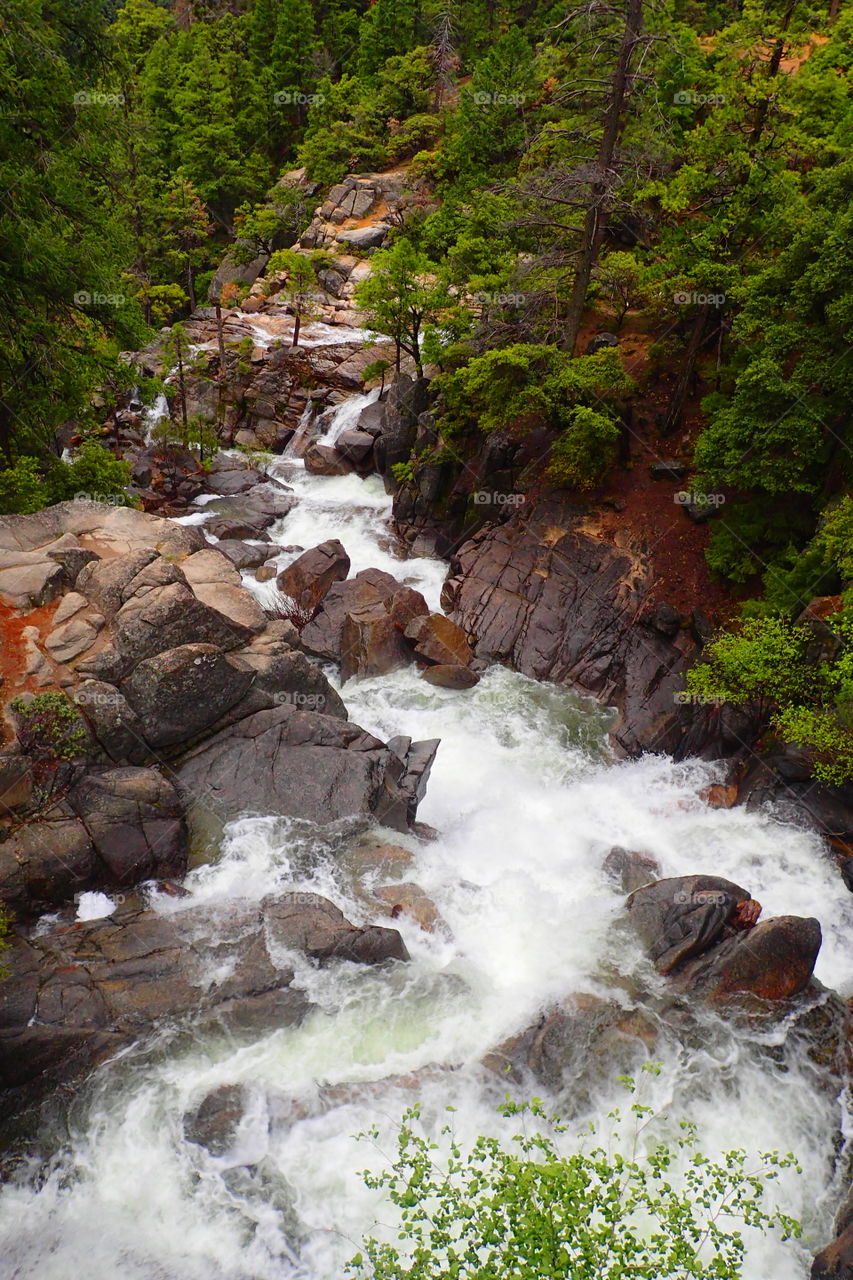 view above a violent river and cascades in Yosemite national park