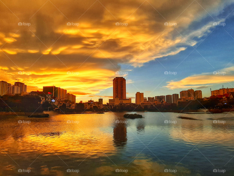 Sunset in Van Quan lake in Ha Noi city, Vietnam