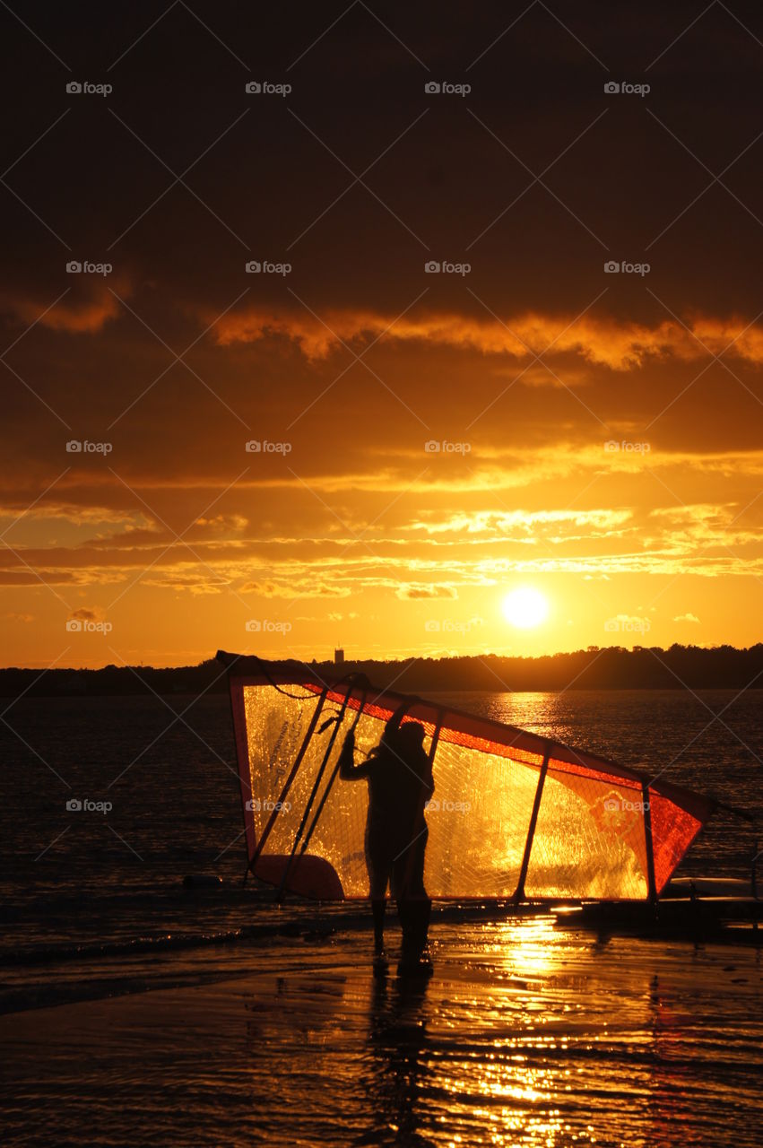 Girl behind the sail