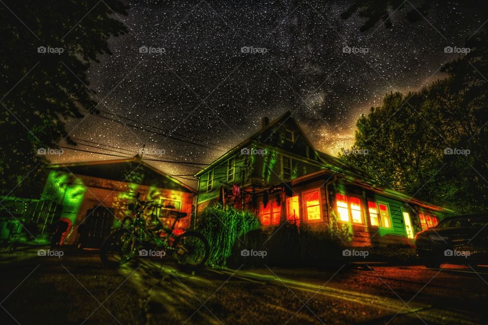 Long exposure on a starry night of the lake house