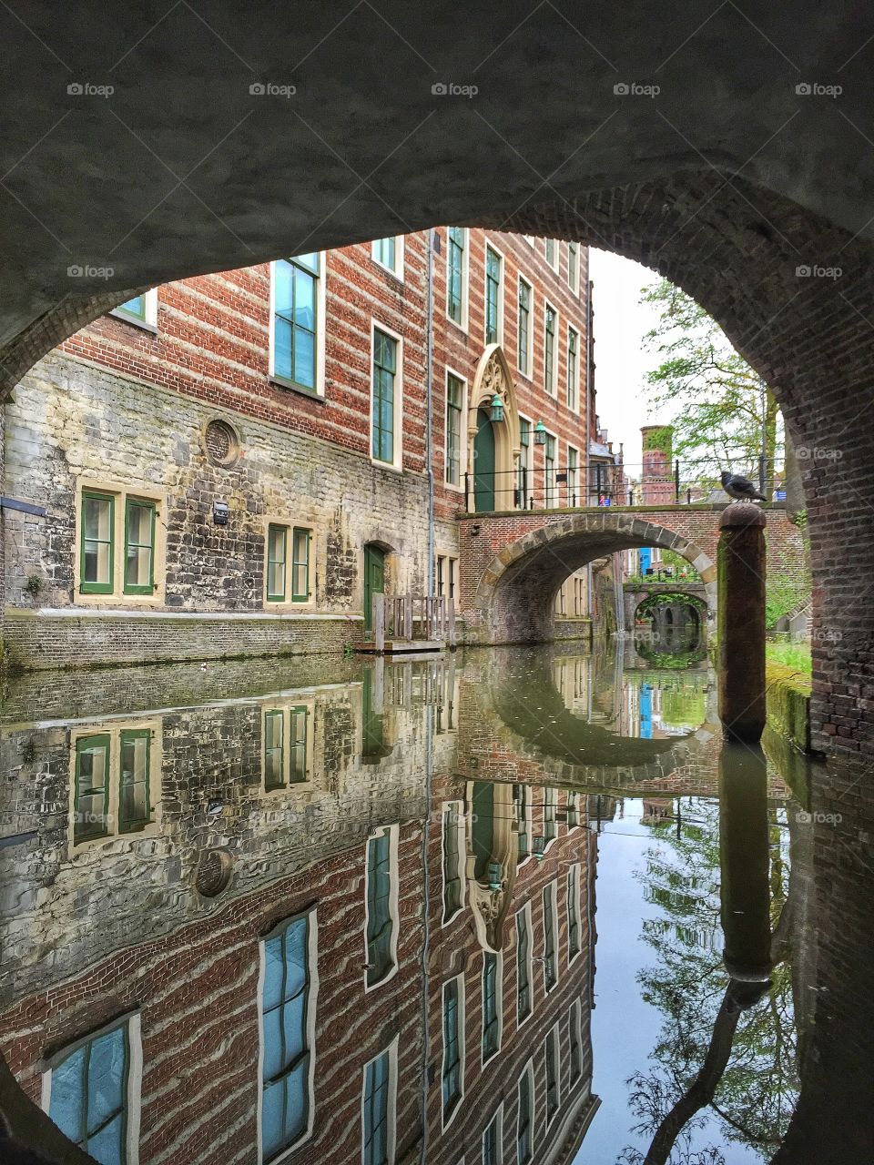 View of canal under a bridge
