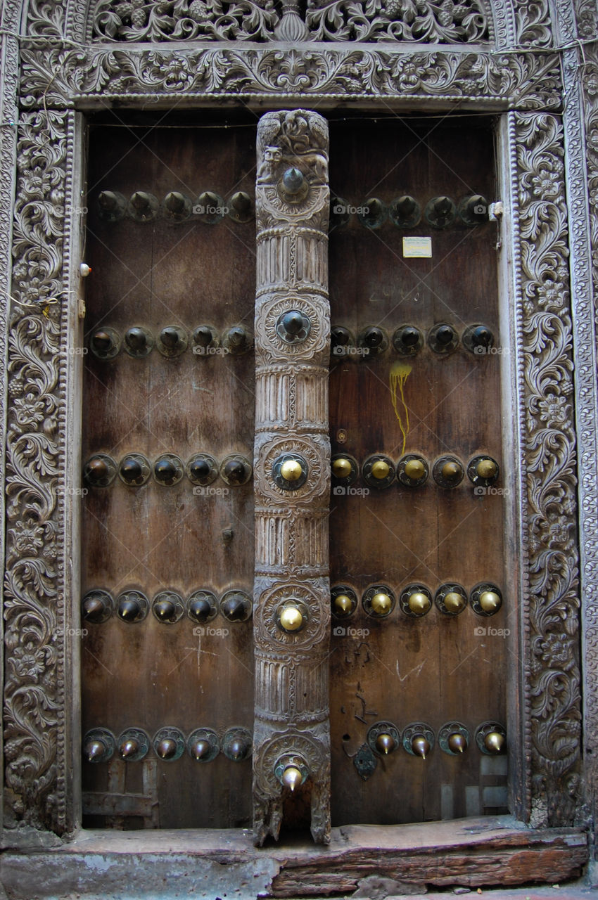 Old worn door in Stonetown on Zanzibar.