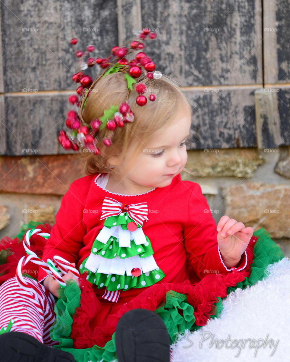 Christmas girl. little girl dressed up for holidays