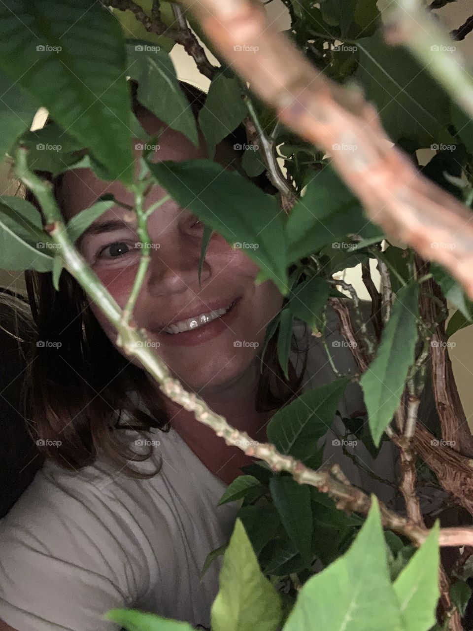 Selfie through a plant 