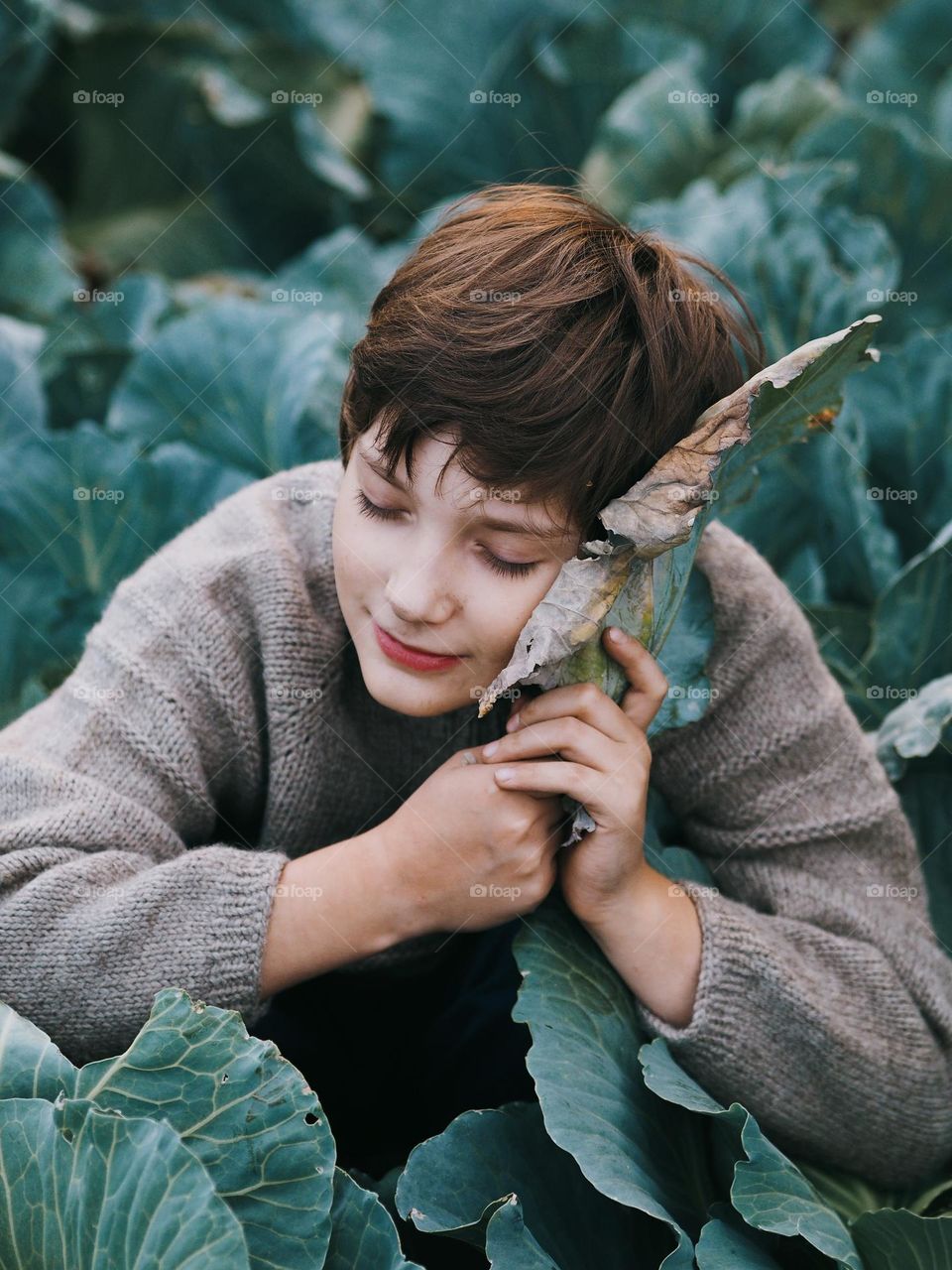 Cute little boy in cabbage 