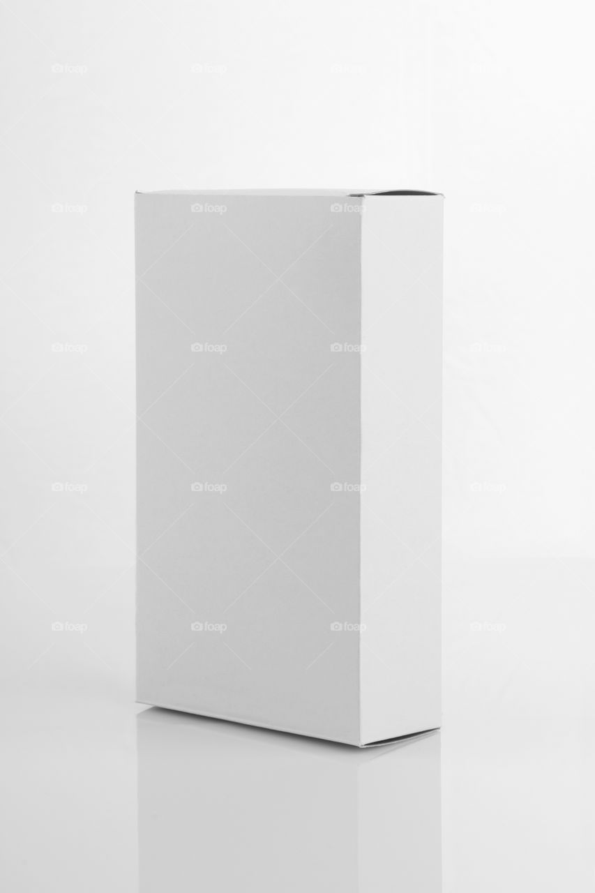 While box on reflective white background for product mockup