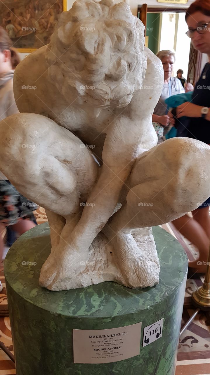 Sculpture of Crouching Boy by Michelangelo, Hermitage Museum, Saint Petersburg, Russia