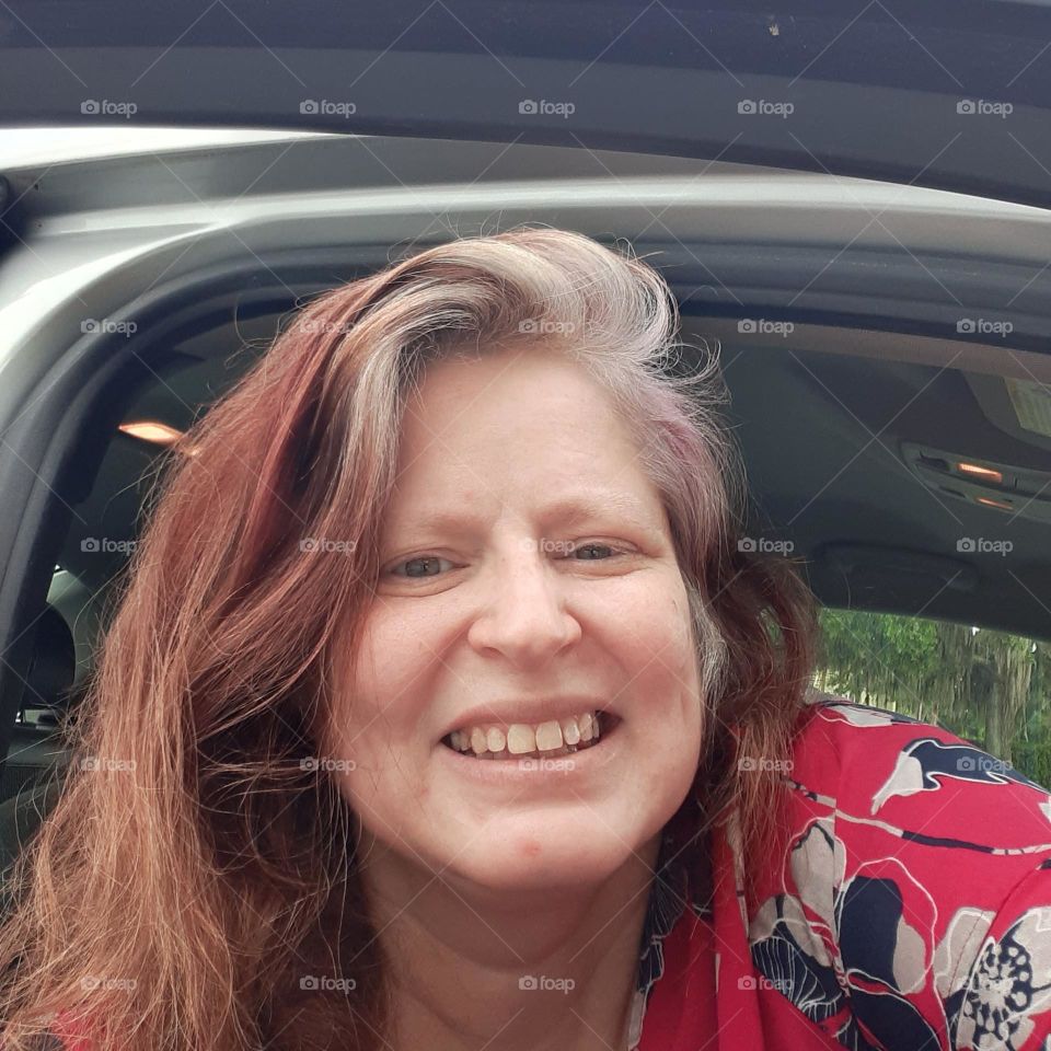 While waiting for some laundry to dry I did a little photoshoot. I took this selfie of me as I am leaning out of the car.