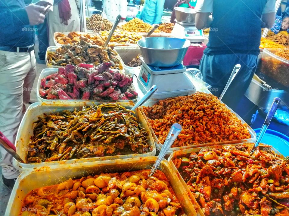 All mix Pickles lemon, chilli, mango, capsicums, street stall in Indian market and ready to sell.