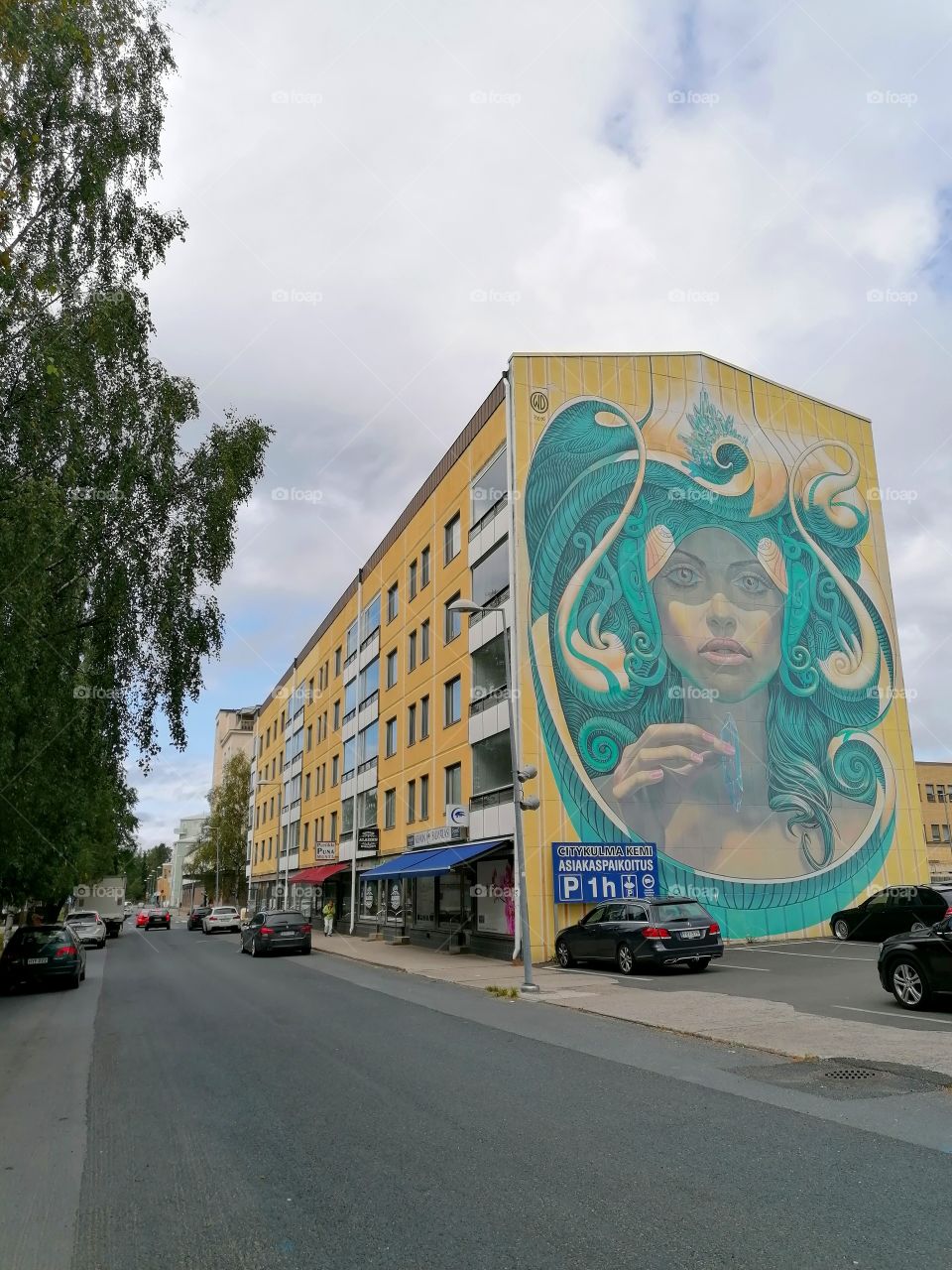 A imaginary great mural in Kemi, Lapland, Finland. By the way, the city is completely empty. No one anywhere. Just that painting brings a little color and life to the city.
