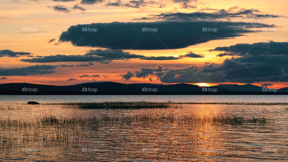 Dramatic cloudy sunset at Corrib lake in Galway, Ireland