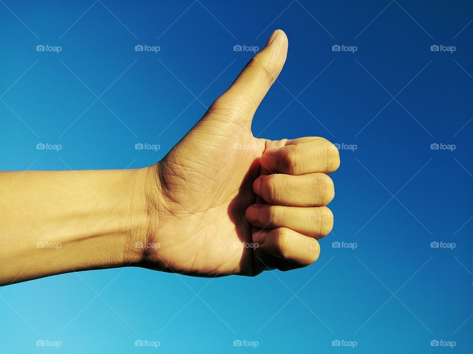 Thumbs up means?